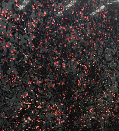 Red Ruby Quartzite translucent thin stone panel shown backlit