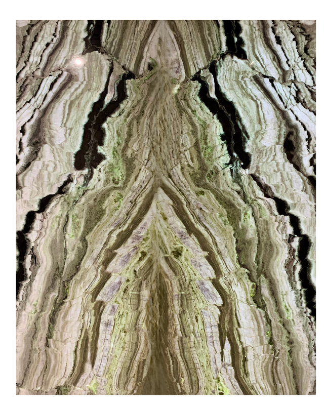 Backlit Green Wave Onyx SkinnyStone feature wall glowing from behind